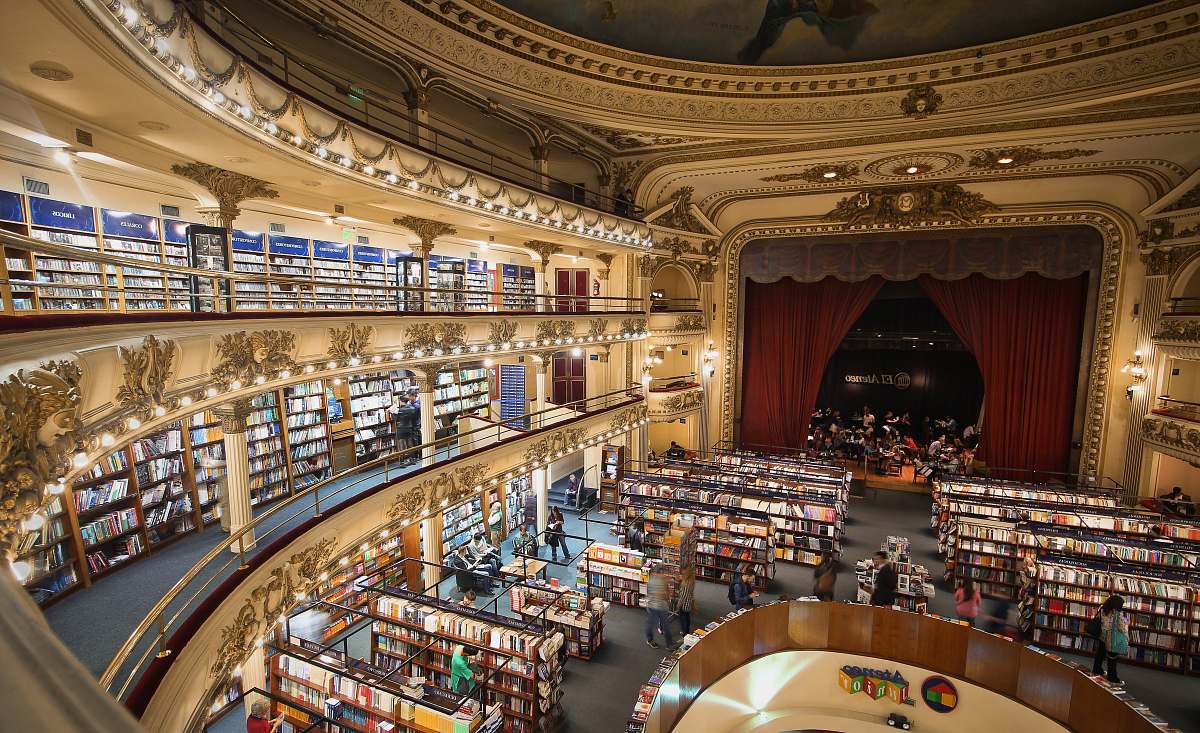 buenos aires high-angle photo of people inside library with mini stage on room's corner argentina